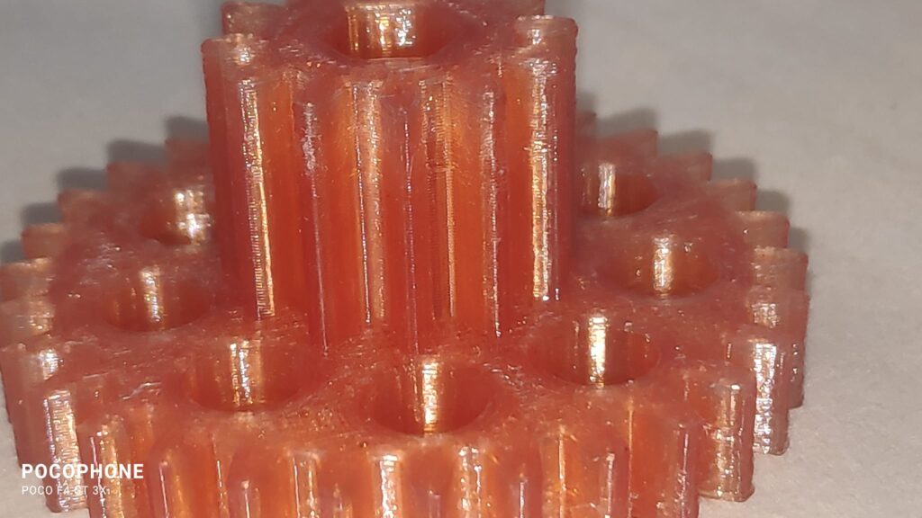 two geared wheel 3D printed from PET bottle filament 